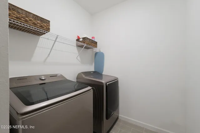 a view of a backyard with a lake view