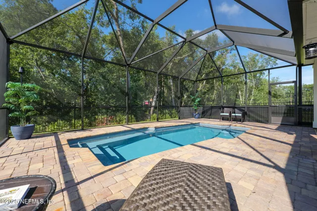 a view of a park with sitting area