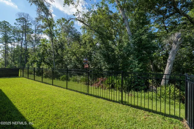 a view of swimming pool with outdoor seating