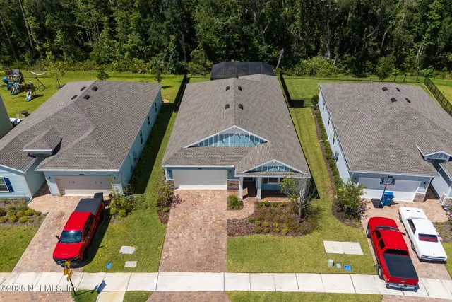 a view of a lake with a yard