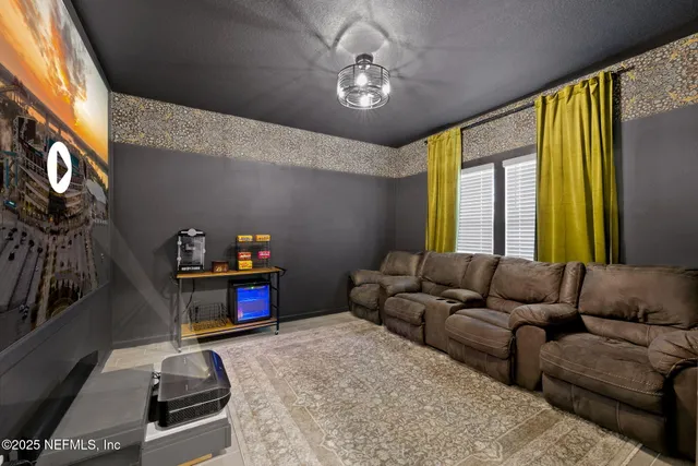 a kitchen with granite countertop a sink stove and refrigerator
