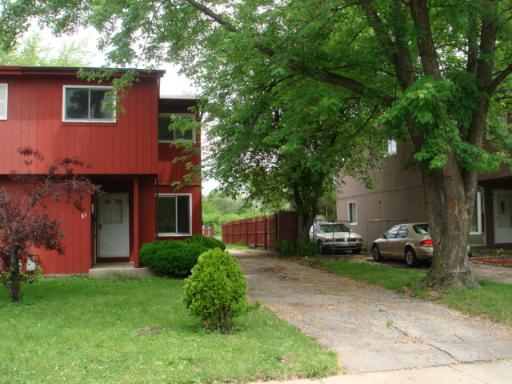 85 Bradford Road, Unit 85 Joliet, IL 60433 - Photo 1 of 1 a front view of a house with a garden