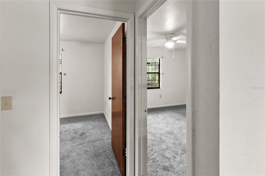 1018 Southwest 60 Terrace, Unit A Gainesville, FL 32607 - Photo 8 of 11 a view of a hallway with a rooms