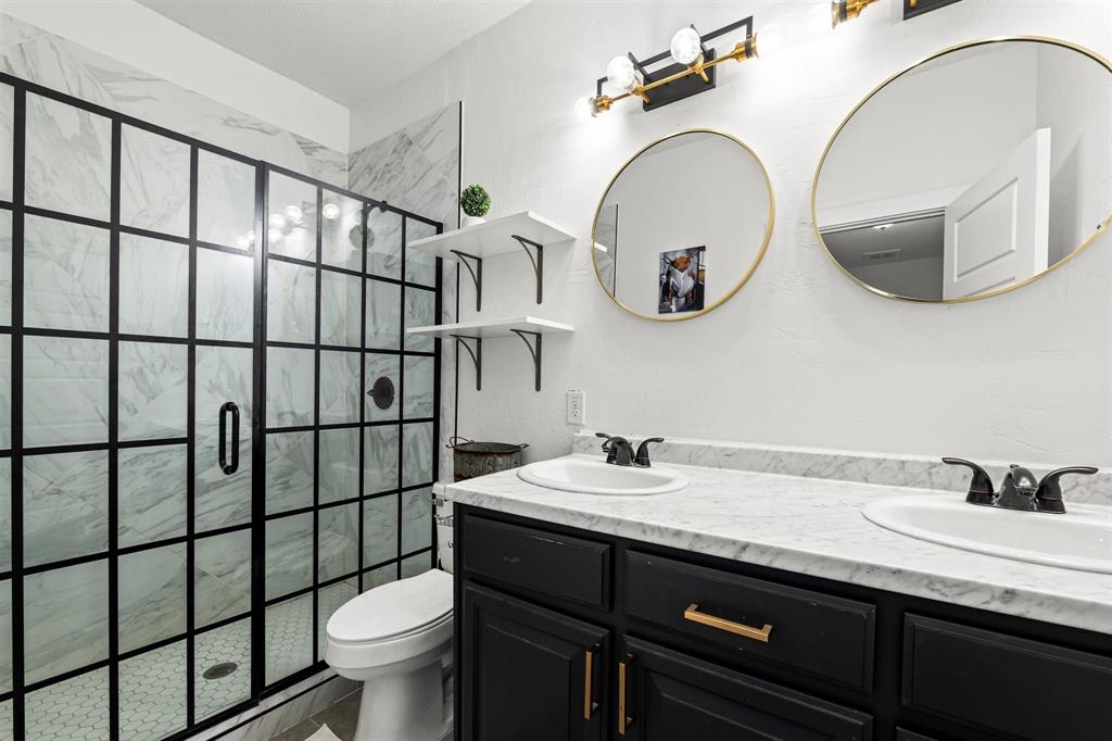 3100 North 27th Street Waco, TX 76708 - Photo 8 of 27 a bathroom with a sink and a mirror