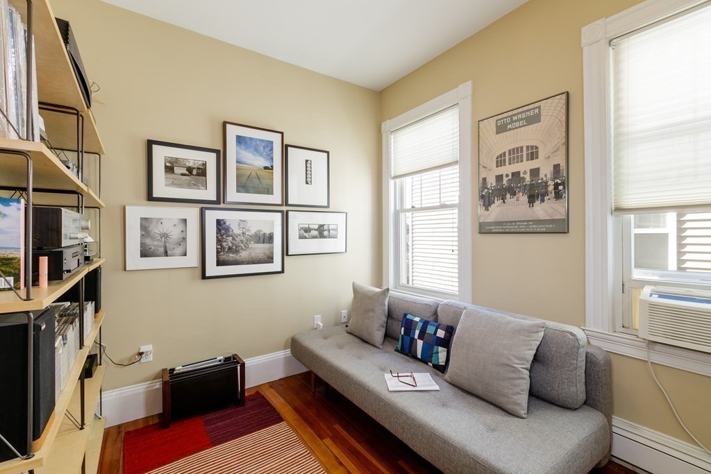273-275 Concord Avenue, Unit 2 Cambridge, MA 02138 - Photo 15 of 24 a living room with furniture and a window