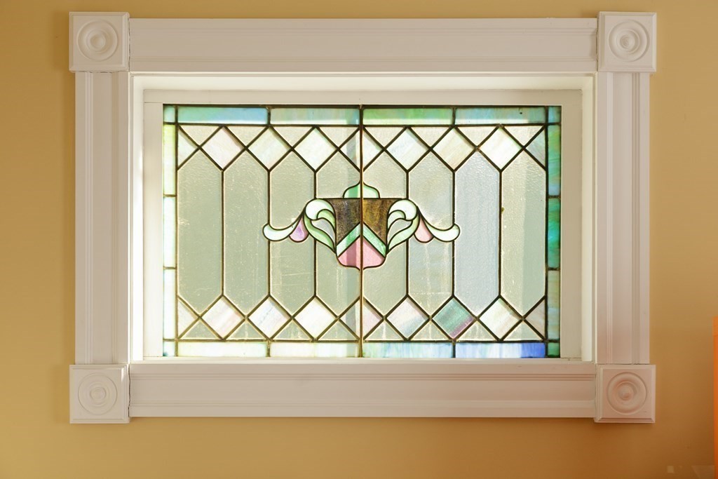 273-275 Concord Avenue, Unit 2 Cambridge, MA 02138 - Photo 17 of 24 a white wall with a large window