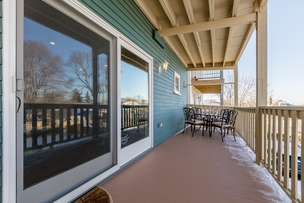 273-275 Concord Avenue, Unit 2 Cambridge, MA 02138 - Photo 18 of 24 a view of a porch with chairs