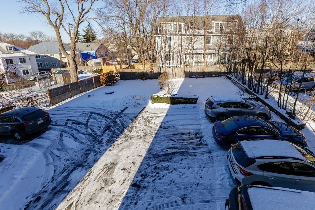 273-275 Concord Avenue, Unit 2 Cambridge, MA 02138 - Photo 22 of 24 a view of a city with cars
