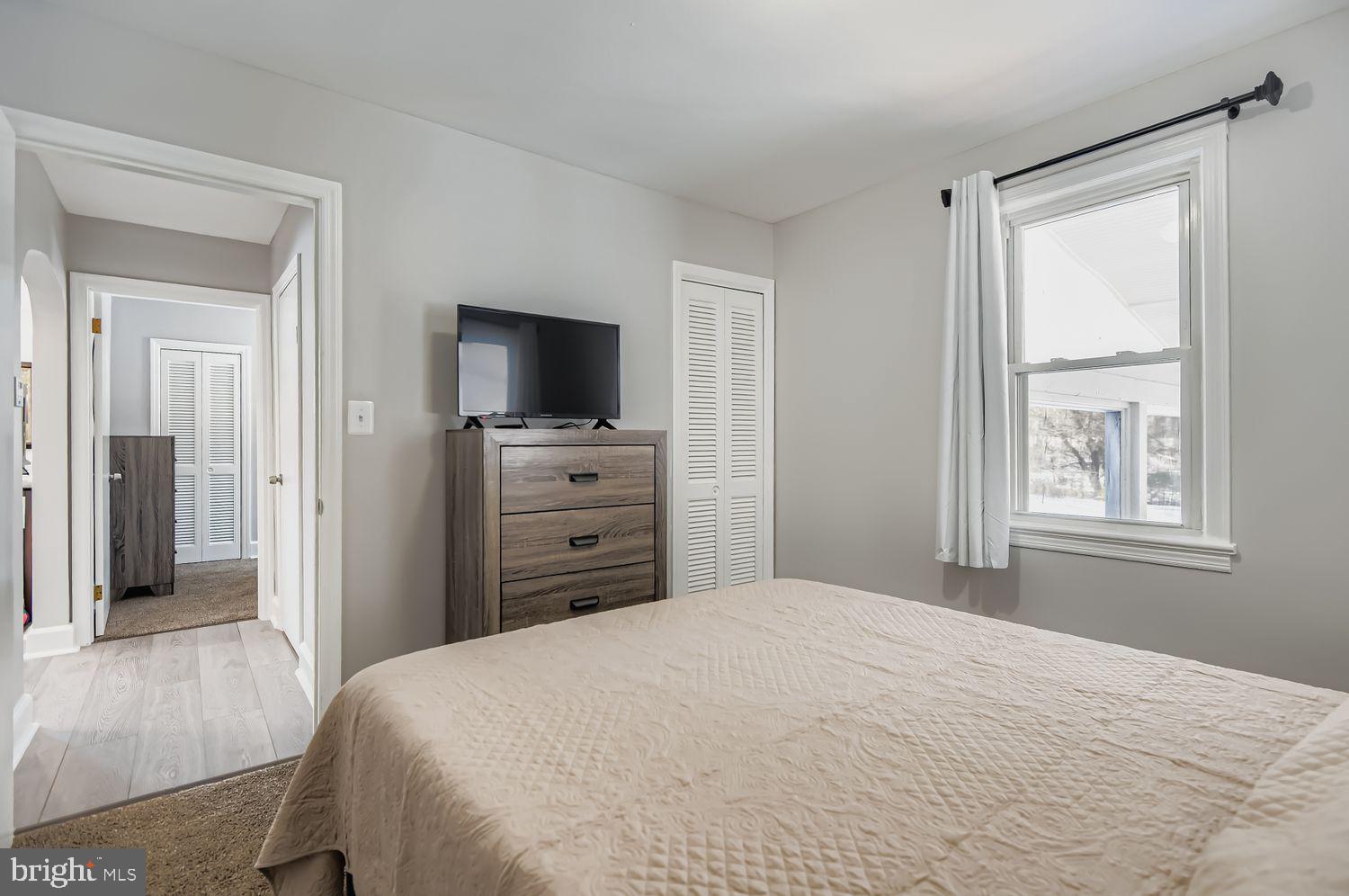 107 Calvary Road Churchville, MD 21028 - Photo 12 of 31 a bedroom with a bed and a flat screen tv