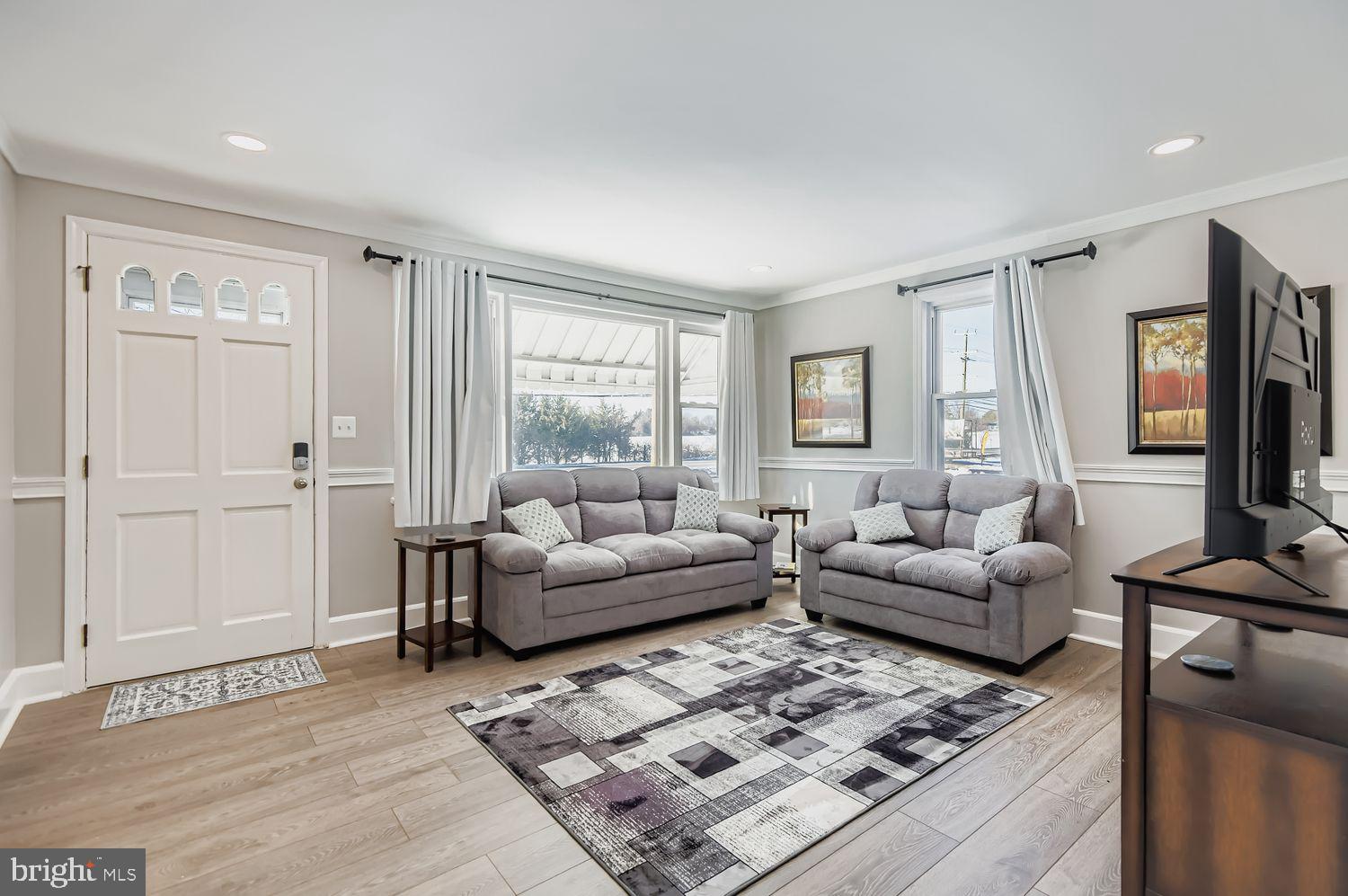 107 Calvary Road Churchville, MD 21028 - Photo 4 of 31 a living room with furniture and a flat screen tv