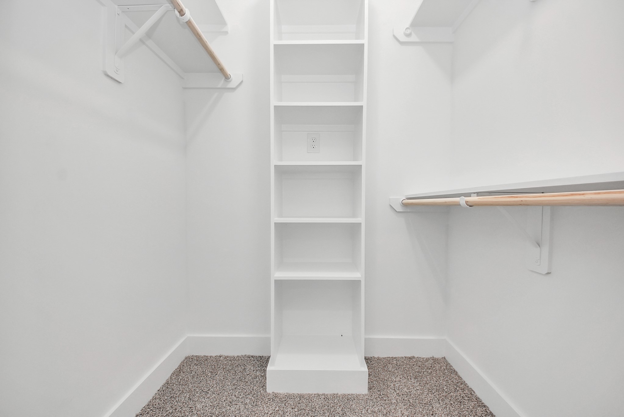 611 East 39th Street, Unit D Houston, TX 77022 - Photo 19 of 33 a view of walk in closet with empty racks