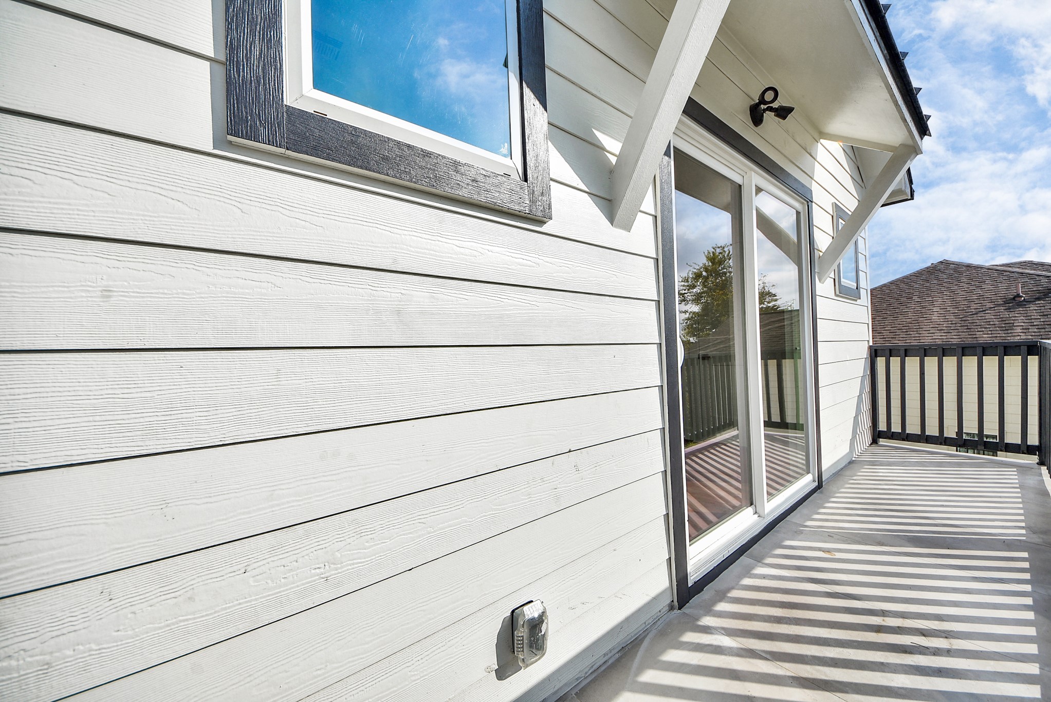 611 East 39th Street, Unit D Houston, TX 77022 - Photo 28 of 33 a view of a house with a door and wooden floor