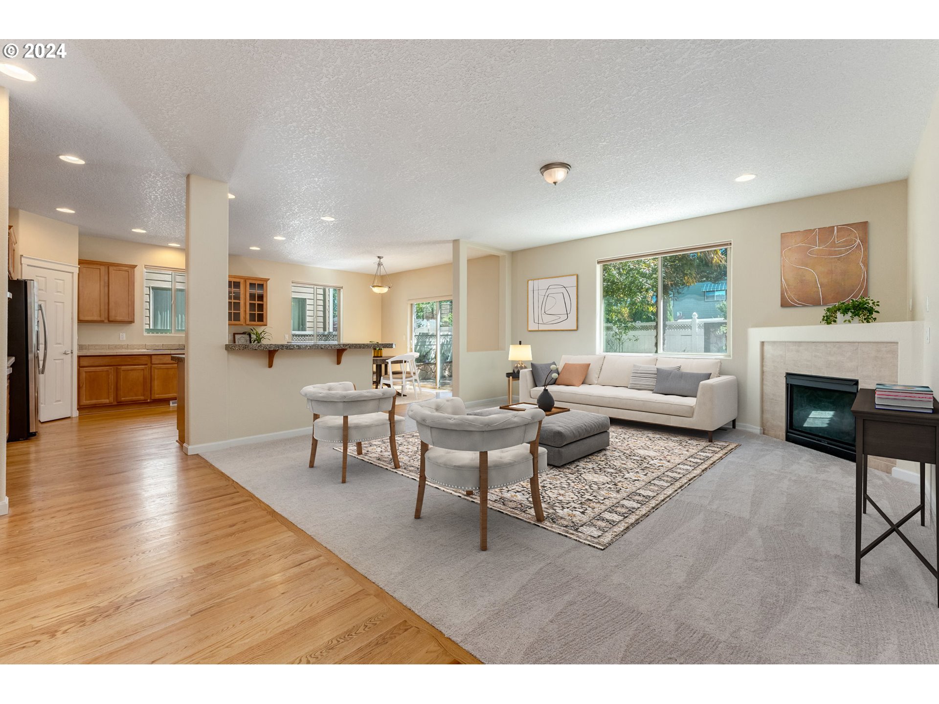 768 North 28th Avenue Cornelius, OR 97113 - Photo 11 of 40 a living room with furniture and a fireplace