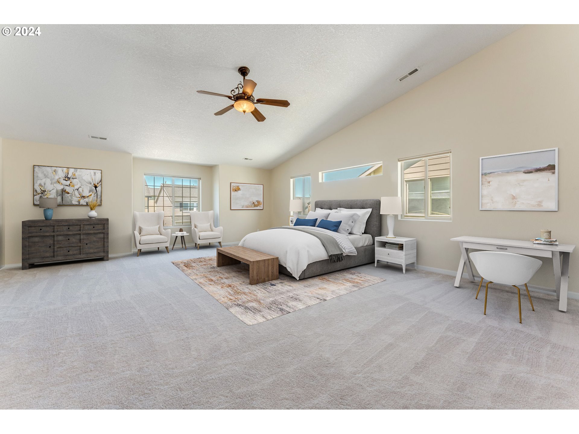 768 North 28th Avenue Cornelius, OR 97113 - Photo 21 of 40 a spacious bedroom with a bed a couch and a chandelier