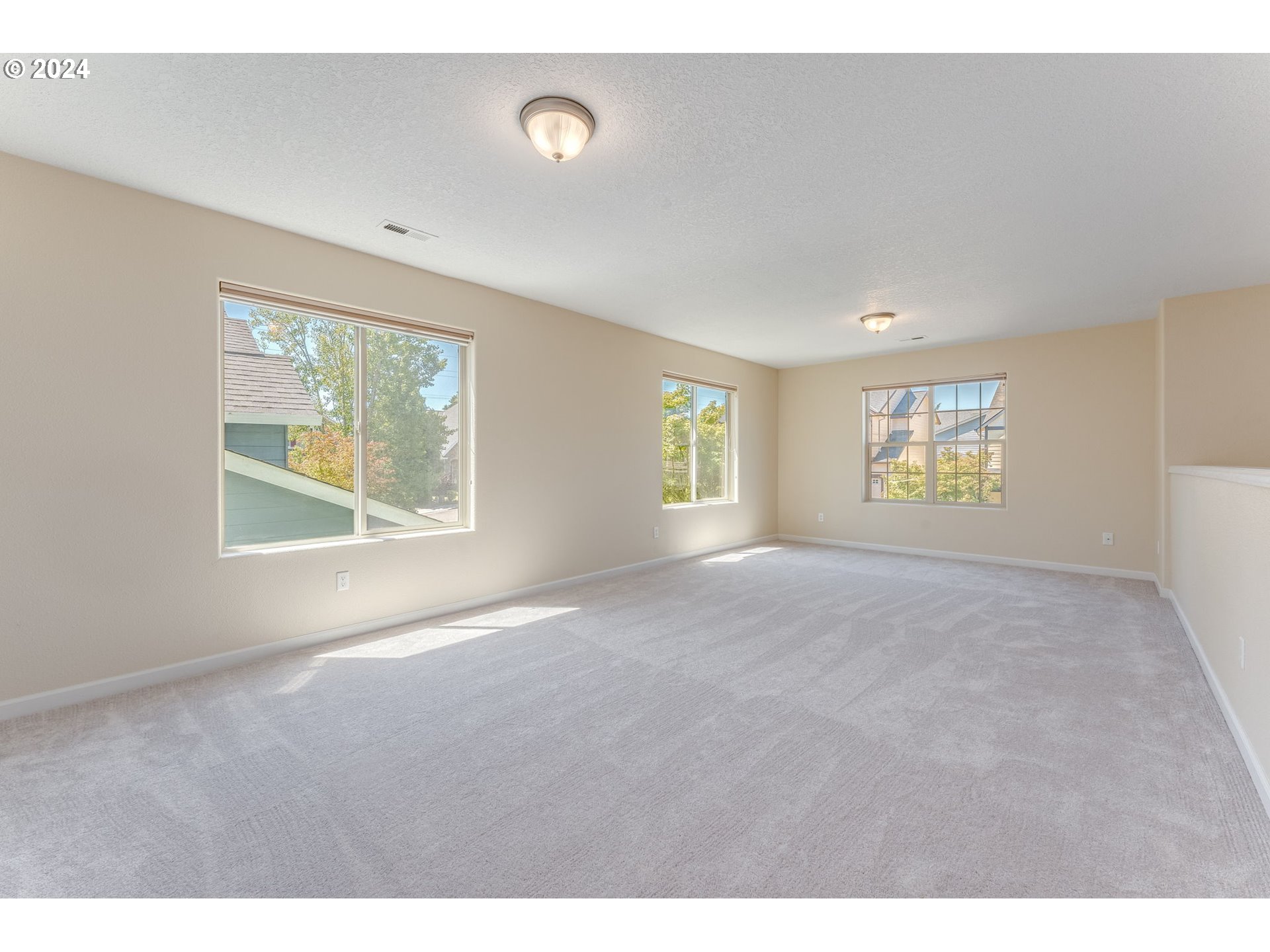 768 North 28th Avenue Cornelius, OR 97113 - Photo 29 of 40 a view of an empty room with windows