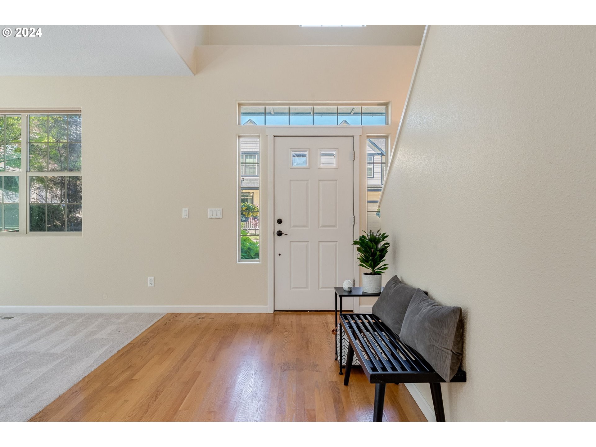 768 North 28th Avenue Cornelius, OR 97113 - Photo 3 of 40 a view of an entryway with wooden floor