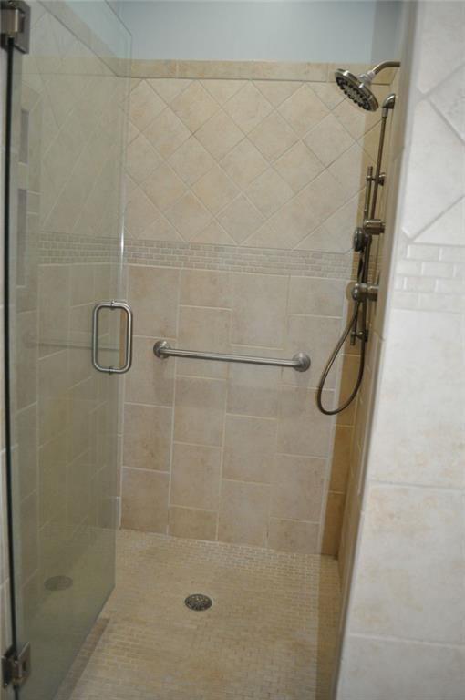 731 Hidden Lakes Trail Jefferson, GA 30549 - Photo 32 of 70 a bathroom with a shower