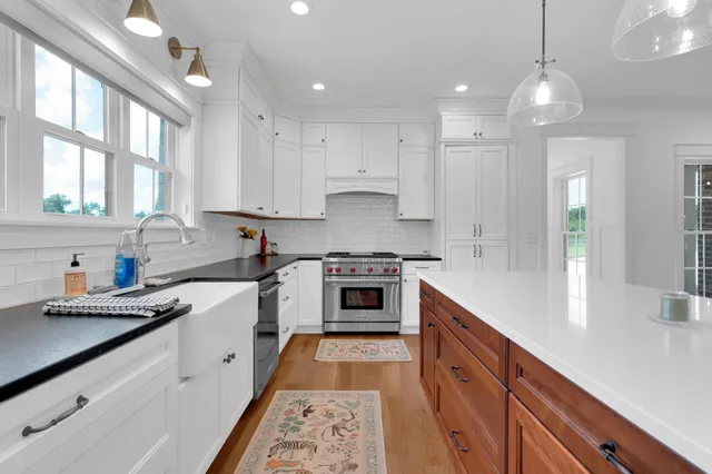 a view of entryway with stairs and wooden floor