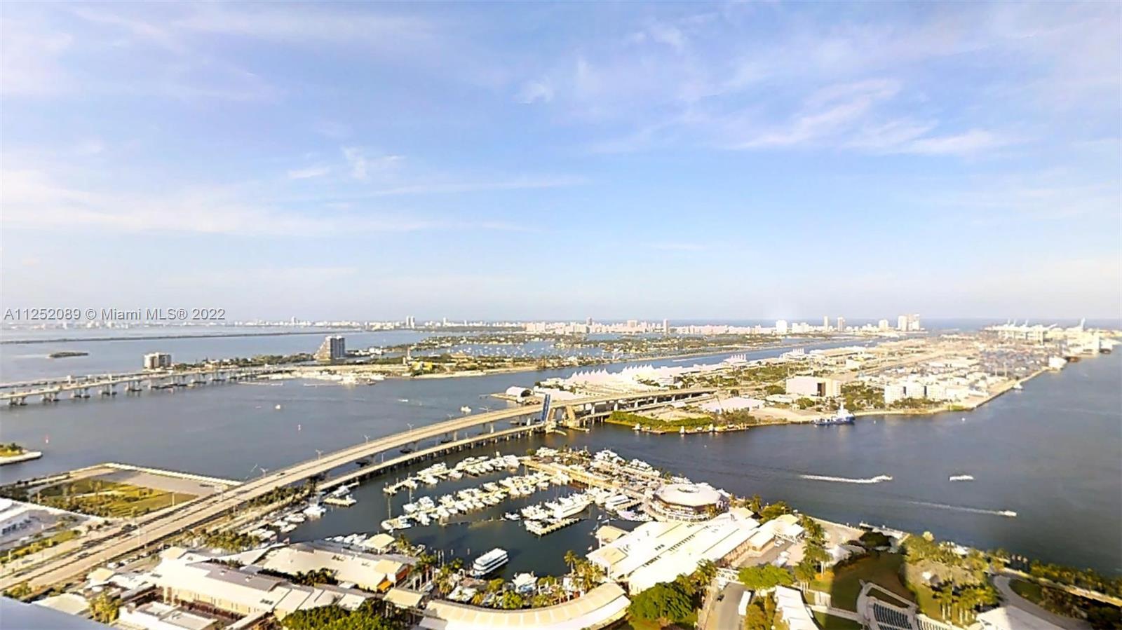 244 Biscayne Boulevard, Unit 4503 Miami, FL 33132 - Photo 2 of 33 an aerial view of ocean and residential houses with outdoor space