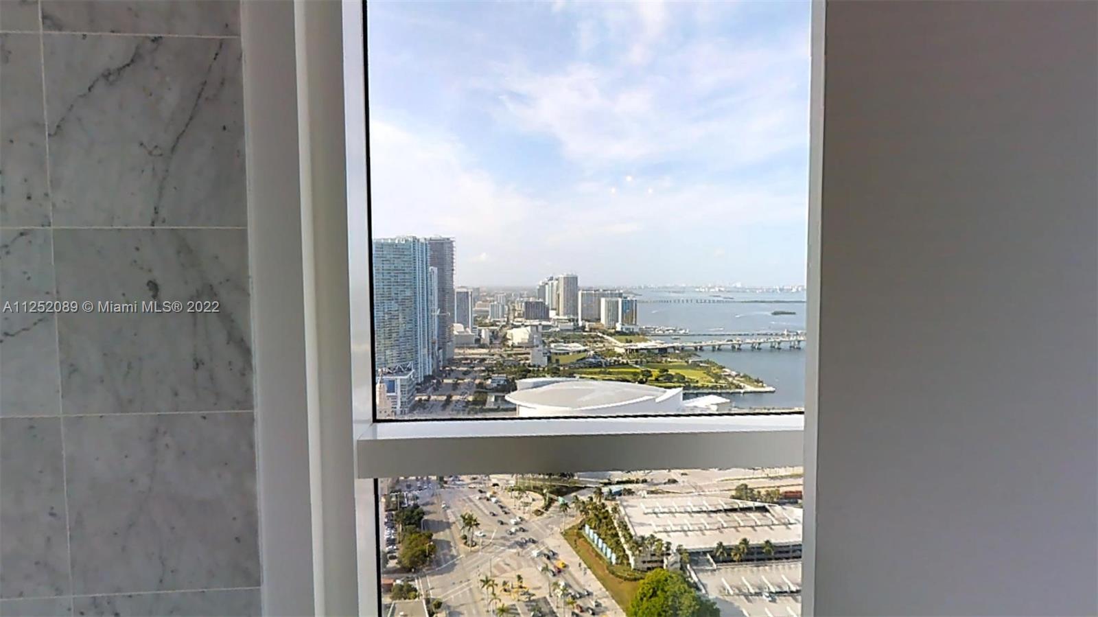 244 Biscayne Boulevard, Unit 4503 Miami, FL 33132 - Photo 25 of 33 a view of a city from a window