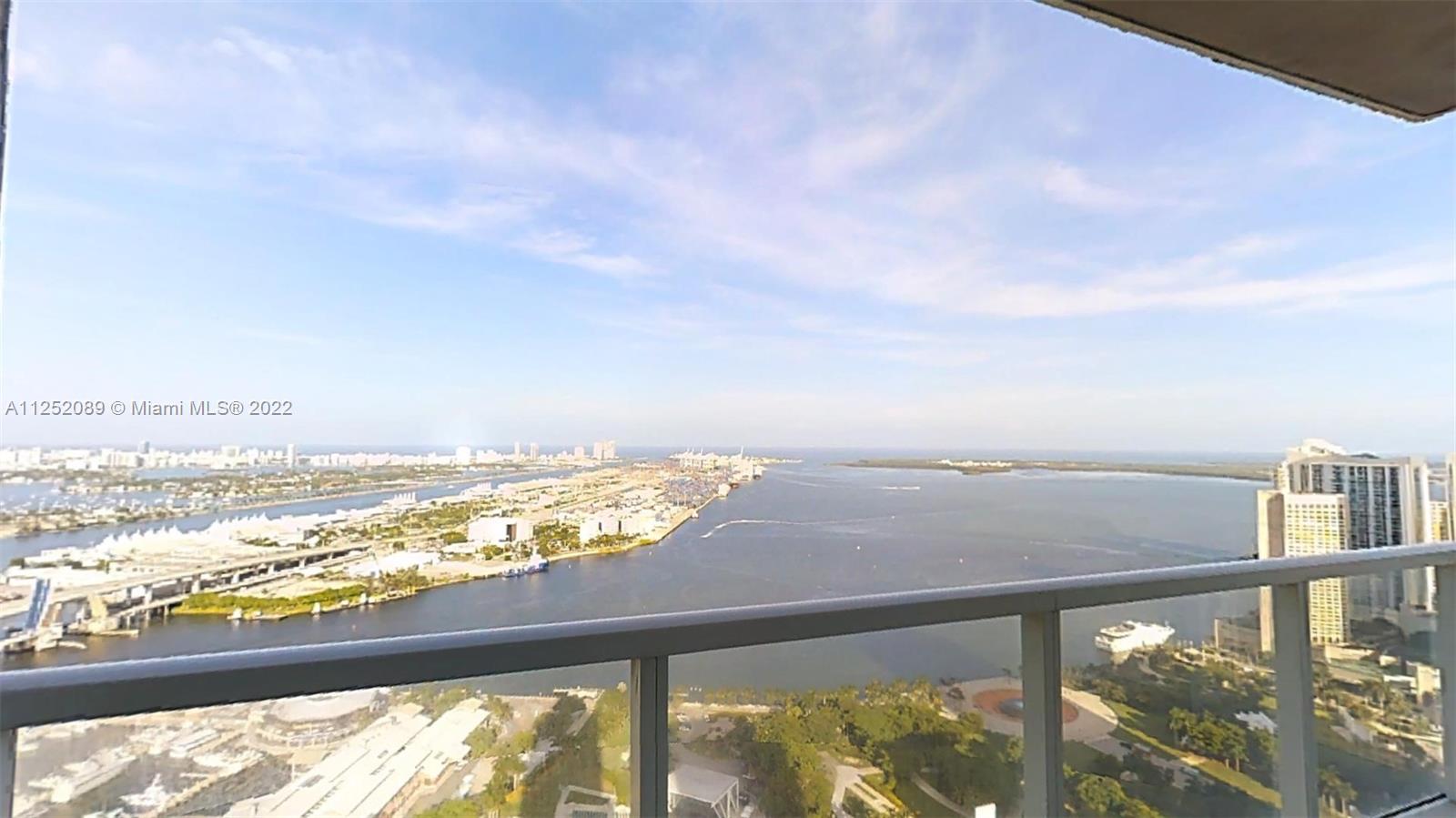 244 Biscayne Boulevard, Unit 4503 Miami, FL 33132 - Photo 6 of 33 a view of an ocean from a balcony