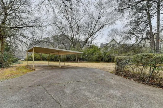 a view of backyard with green space