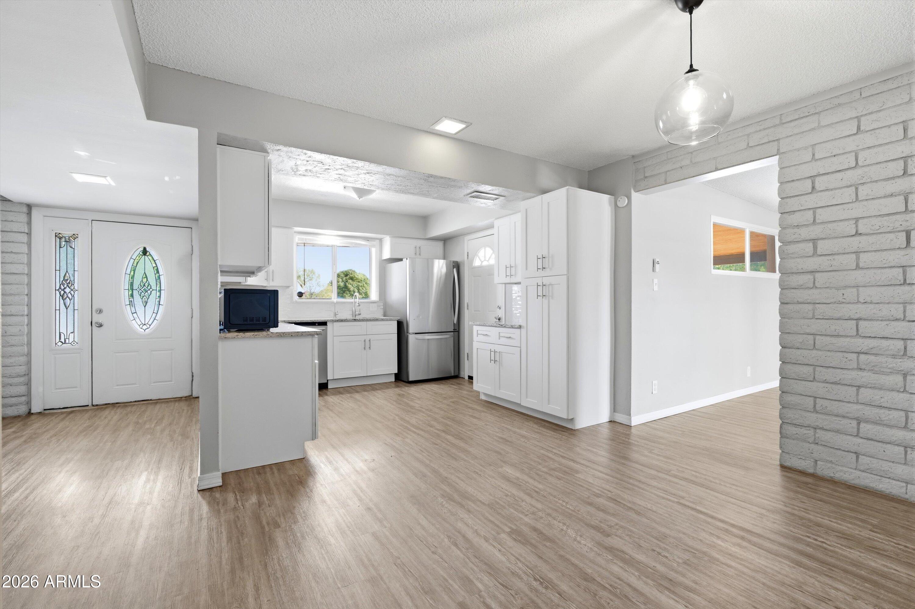 Front Foyer, Kitchen & Dining Area
