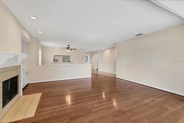 a kitchen with stainless steel appliances granite countertop a sink a stove and cabinets
