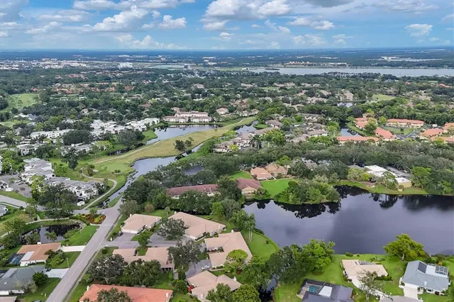 an aerial view of a house with a garden