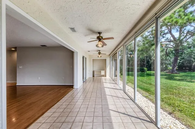 a view of a house with garden and porch