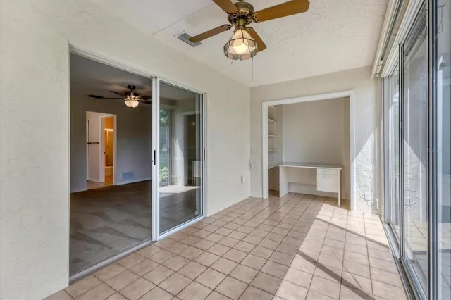 a view of house with backyard