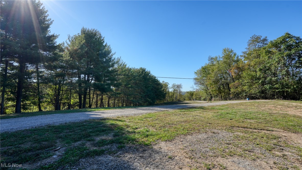 23305 Lashley Road Senecaville, OH 43780 - Photo 13 of 17 View of street with a view of trees
