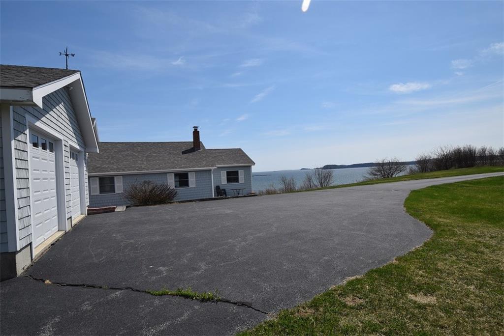 831 Cutler Road Machiasport, ME 04655 - Photo 3 of 35 Paved driveway, two bay attached...