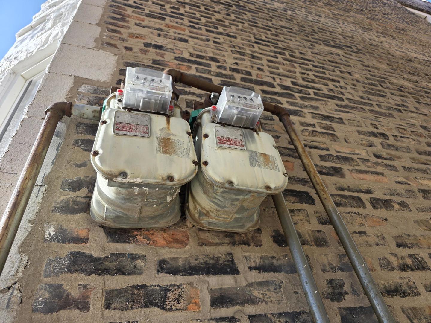 3902 West Fillmore Street Chicago, IL 60624 - Photo 16 of 18 a picture of water heater room