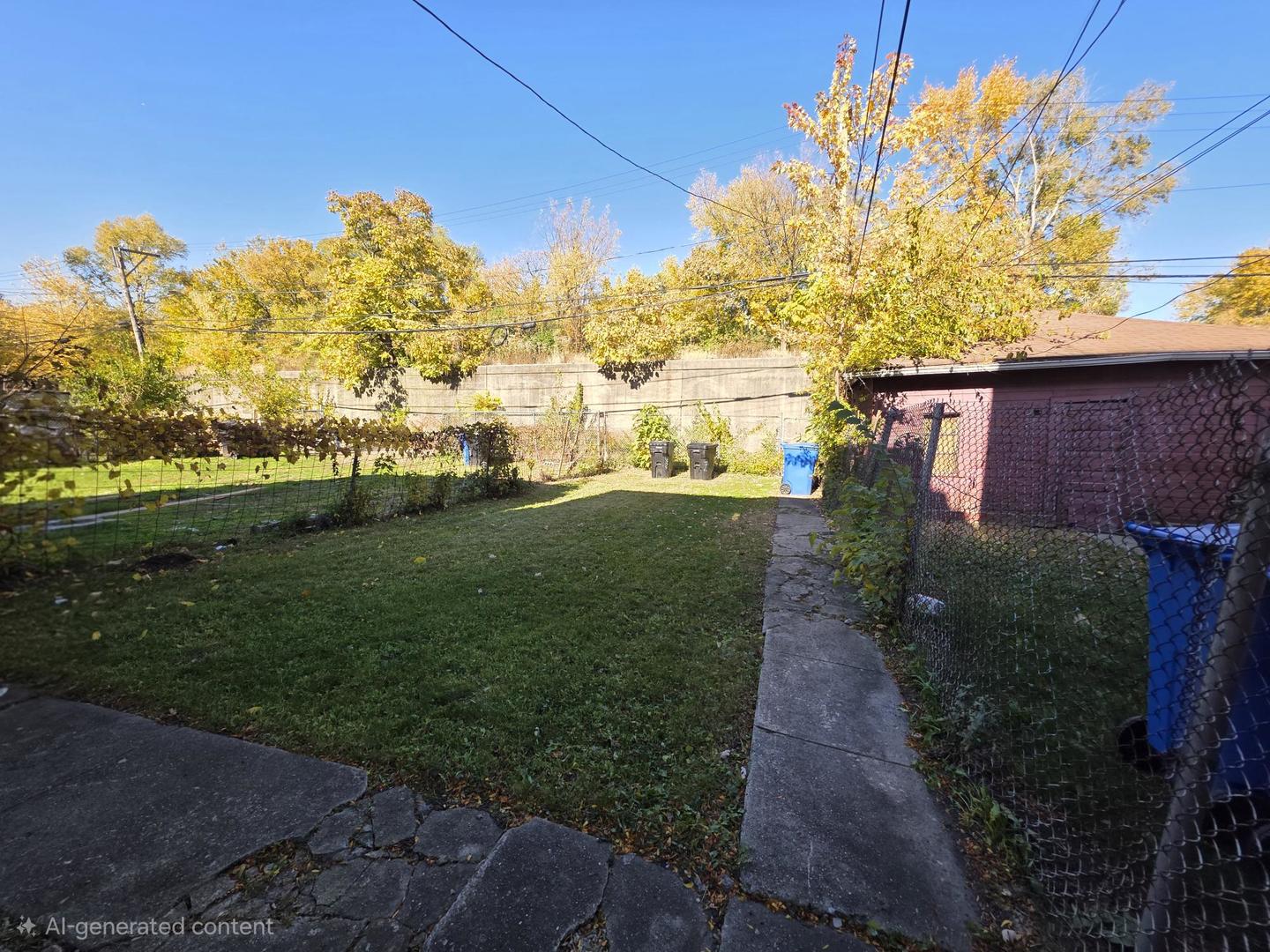 3902 West Fillmore Street Chicago, IL 60624 - Photo 17 of 18 a view of a garden with a building in the background