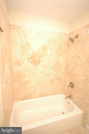 13207 Tamarack Road Silver Spring, MD 20904 - Photo 14 of 24 a bathroom with a bathtub