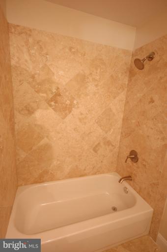 13207 Tamarack Road Silver Spring, MD 20904 - Photo 21 of 24 a bathroom with a bathtub