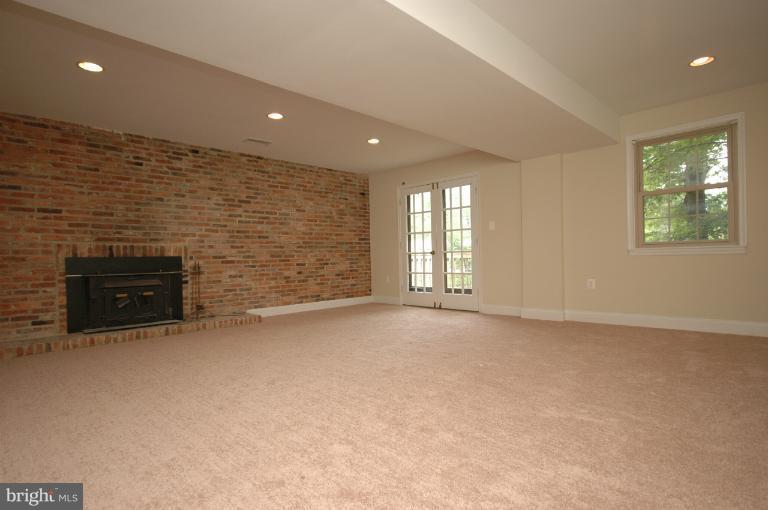 13207 Tamarack Road Silver Spring, MD 20904 - Photo 4 of 24 an empty room with windows