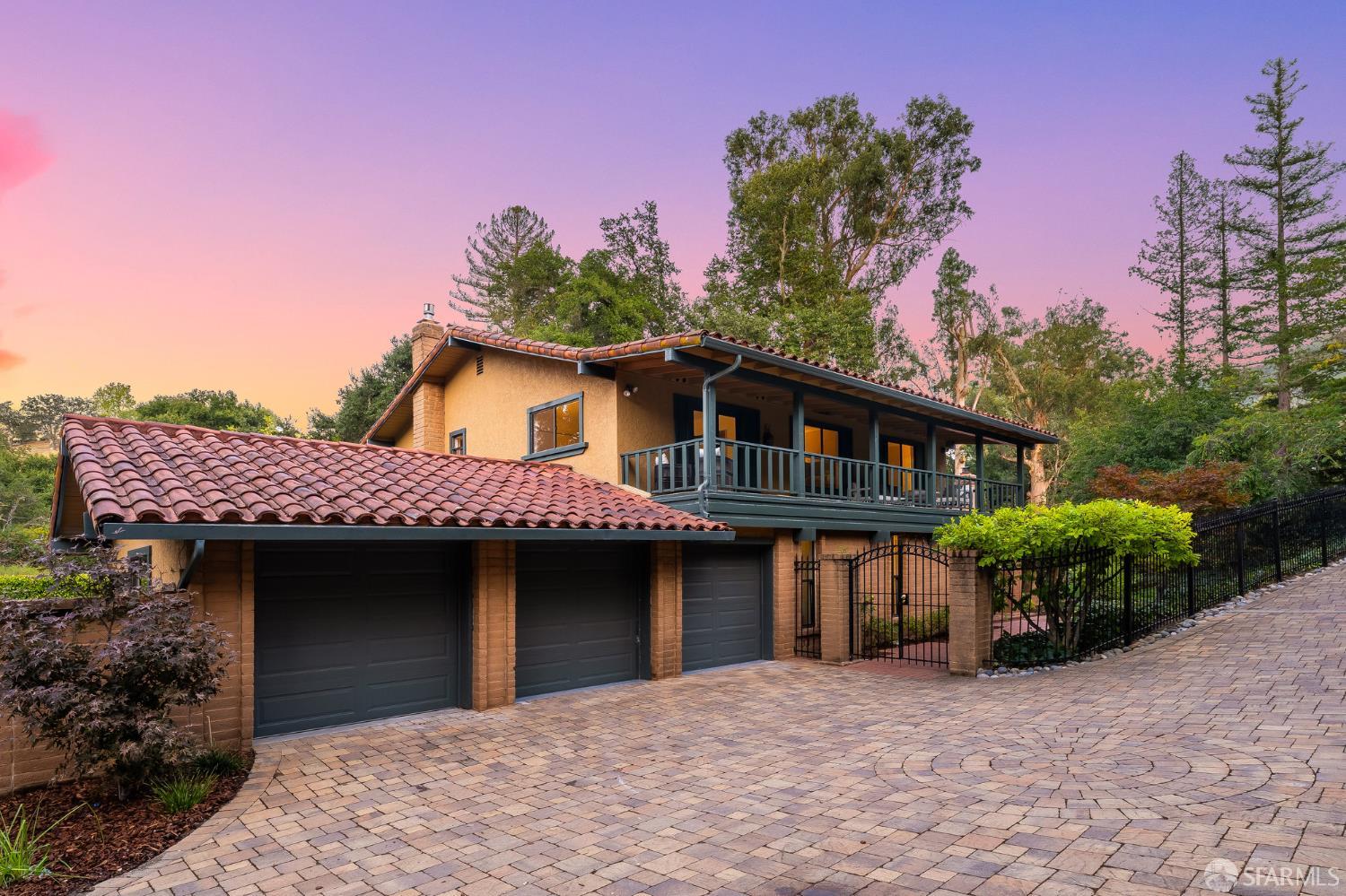 16244 Kennedy Road Los Gatos, CA 95032 - Photo 1 of 67 a front view of a house with a garden