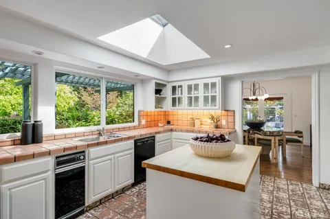 a bedroom with a large bed and a large window