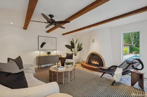 a view of a balcony with chairs