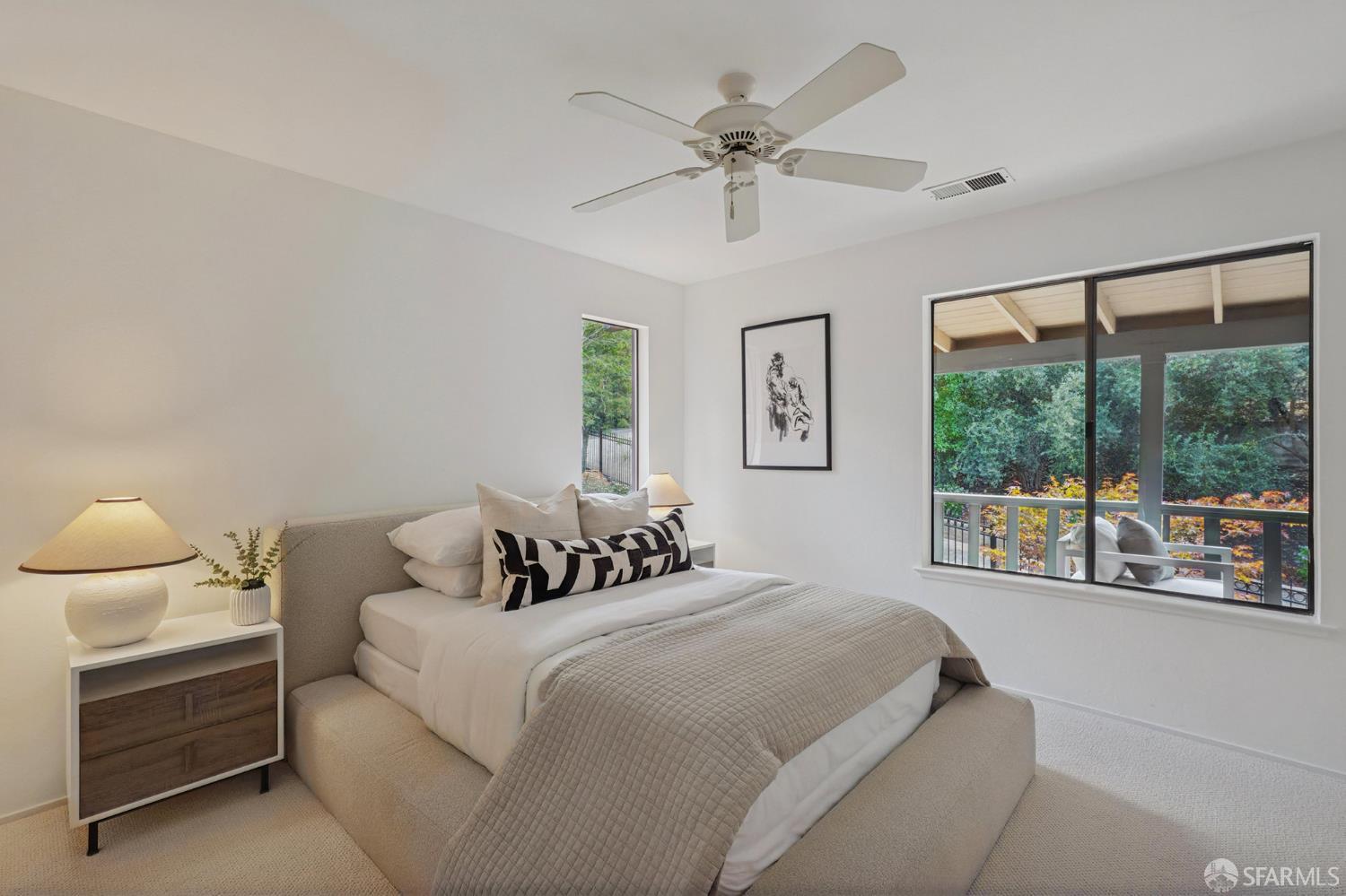 16244 Kennedy Road Los Gatos, CA 95032 - Photo 25 of 67 a bedroom with a large bed and a large window