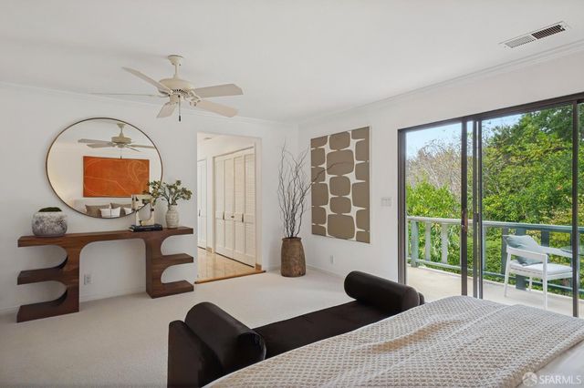 an aerial view of a house with garden space sitting space and trees all around