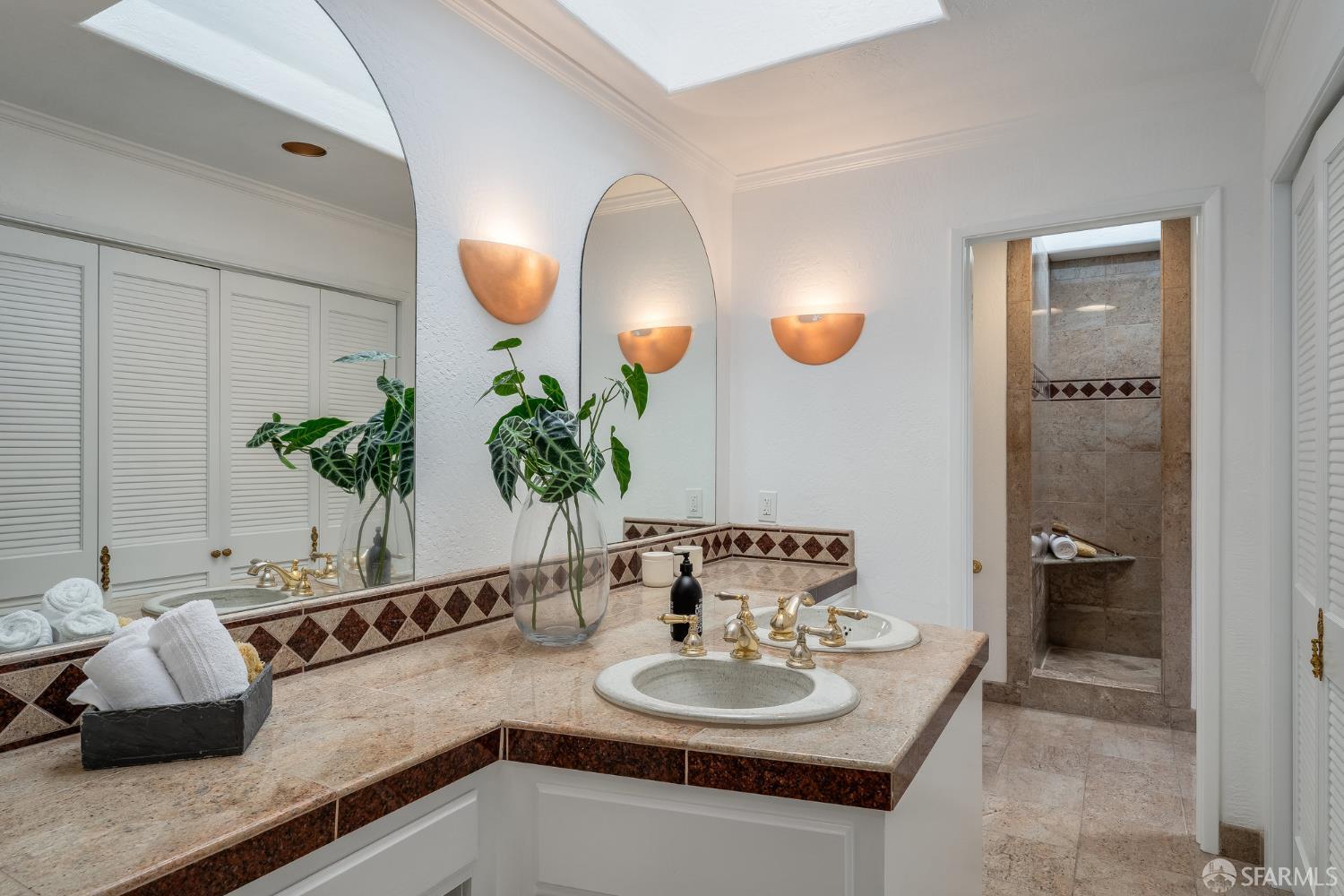 16244 Kennedy Road Los Gatos, CA 95032 - Photo 31 of 67 a bathroom with a granite countertop sink and a mirror