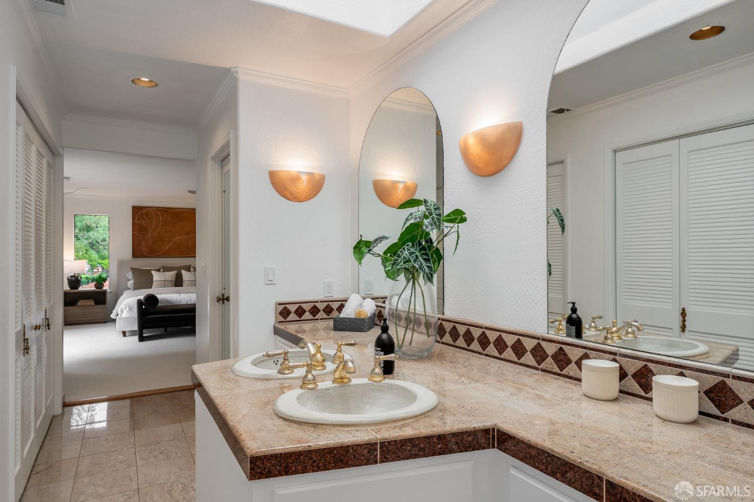 16244 Kennedy Road Los Gatos, CA 95032 - Photo 32 of 67 a bathroom with a granite countertop sink and a mirror