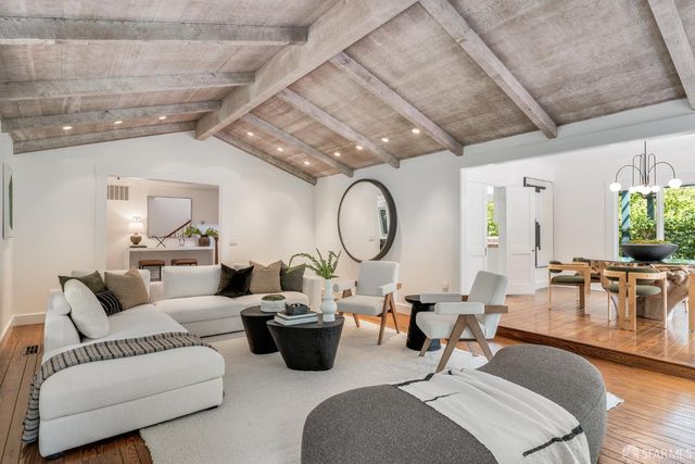 a view of a park with plants and trees