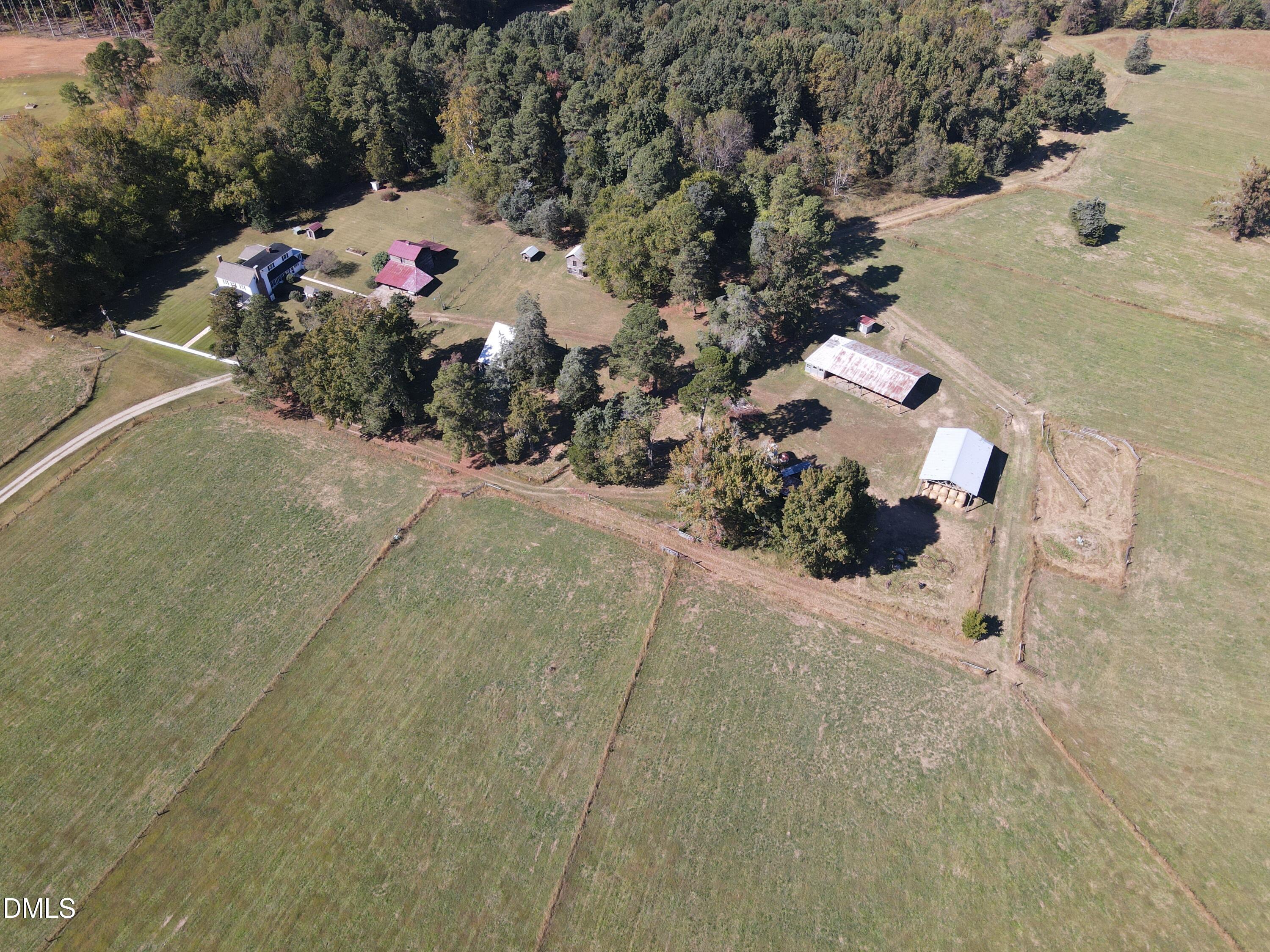 4067 Chewning Road Oxford, NC 27565 - Photo 7 of 82 an aerial view of a house with a yard and garden