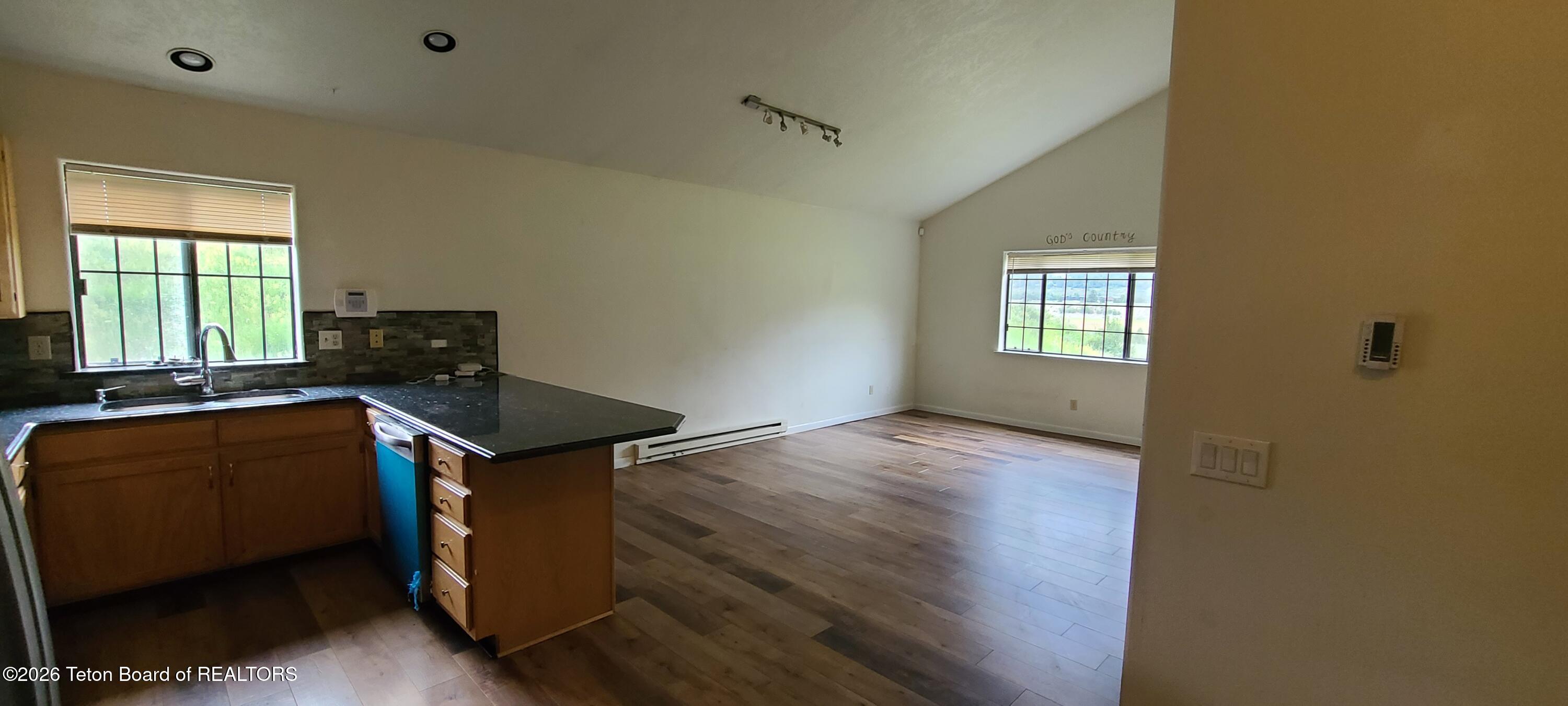 469 Greys River Loop Alpine, WY 83128 - Photo 8 of 24 Kitchen to Family Room