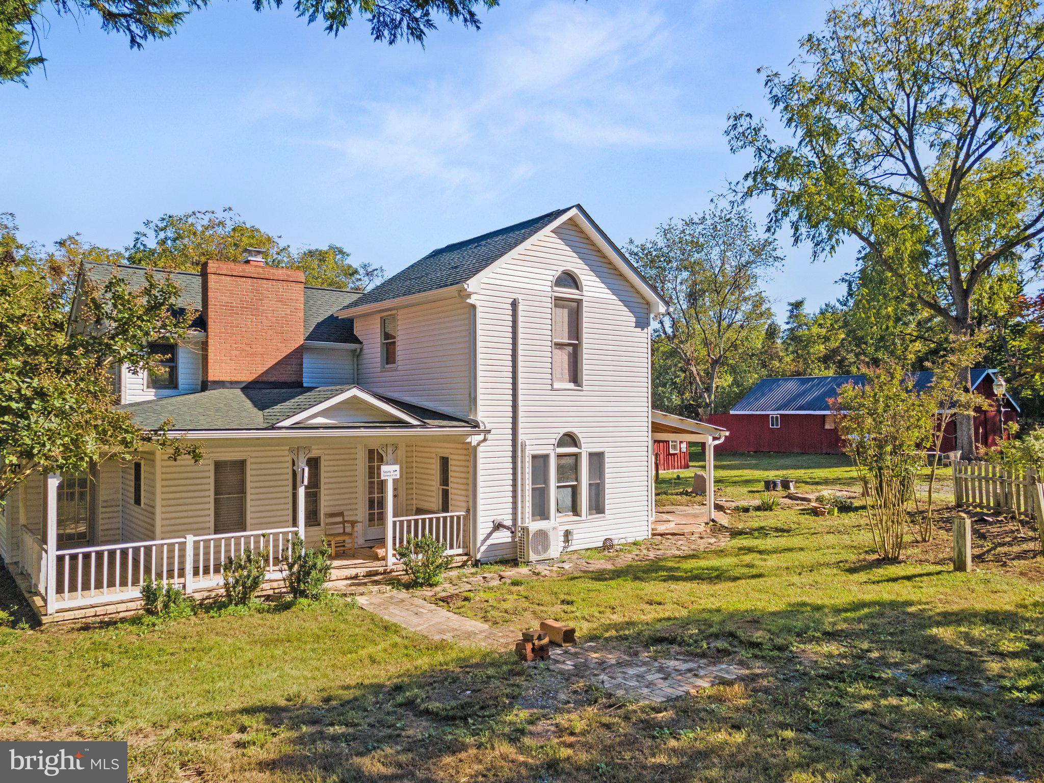 10819 Shanktown Road Big Pool, MD 21711 - Photo 17 of 79 a front view of a house with a yard