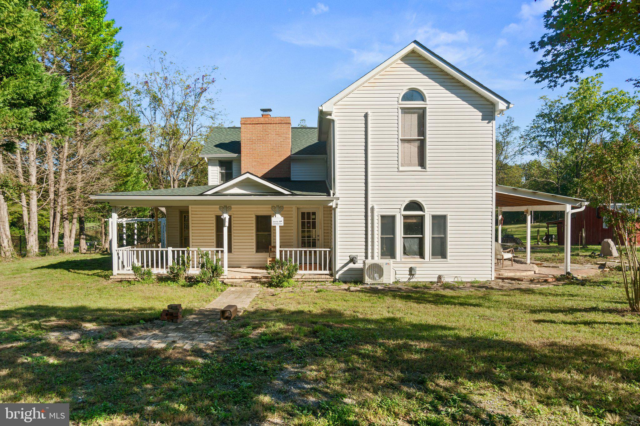 10819 Shanktown Road Big Pool, MD 21711 - Photo 2 of 79 a front view of a house with a yard